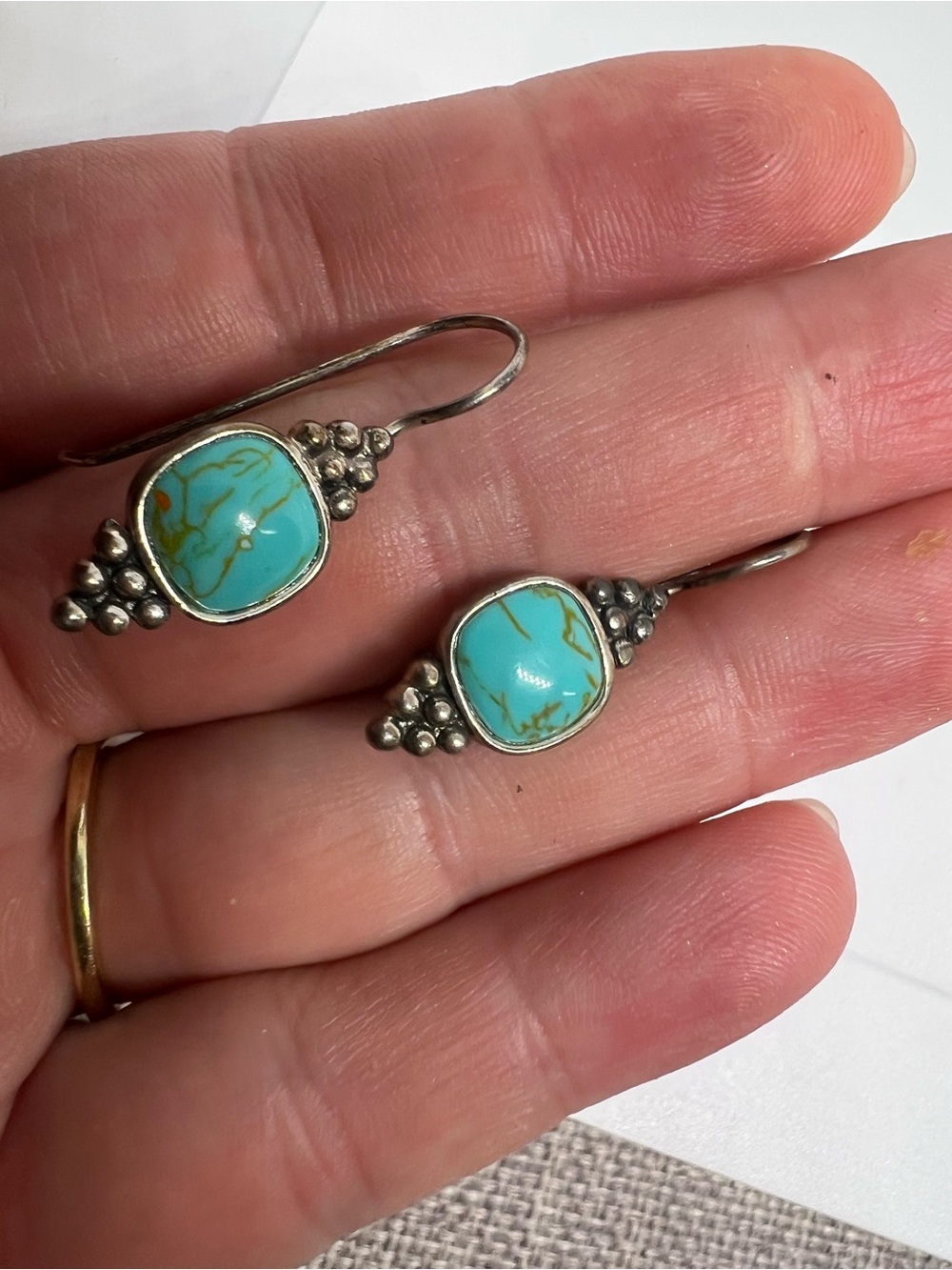 Sterling silver and stabilized turquoise dangle earrings
